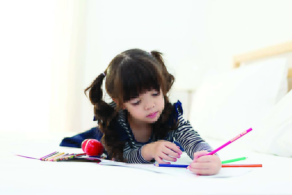 little girl drawing arts and education