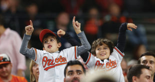 Kids enjoying Baltimore Orioles games