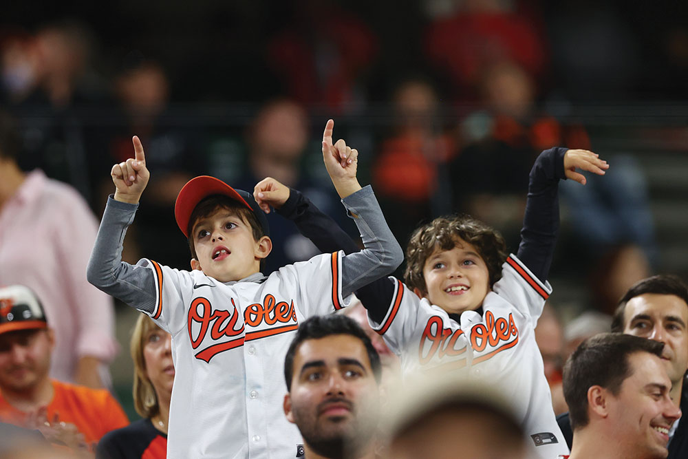 Kids enjoying Baltimore Orioles games