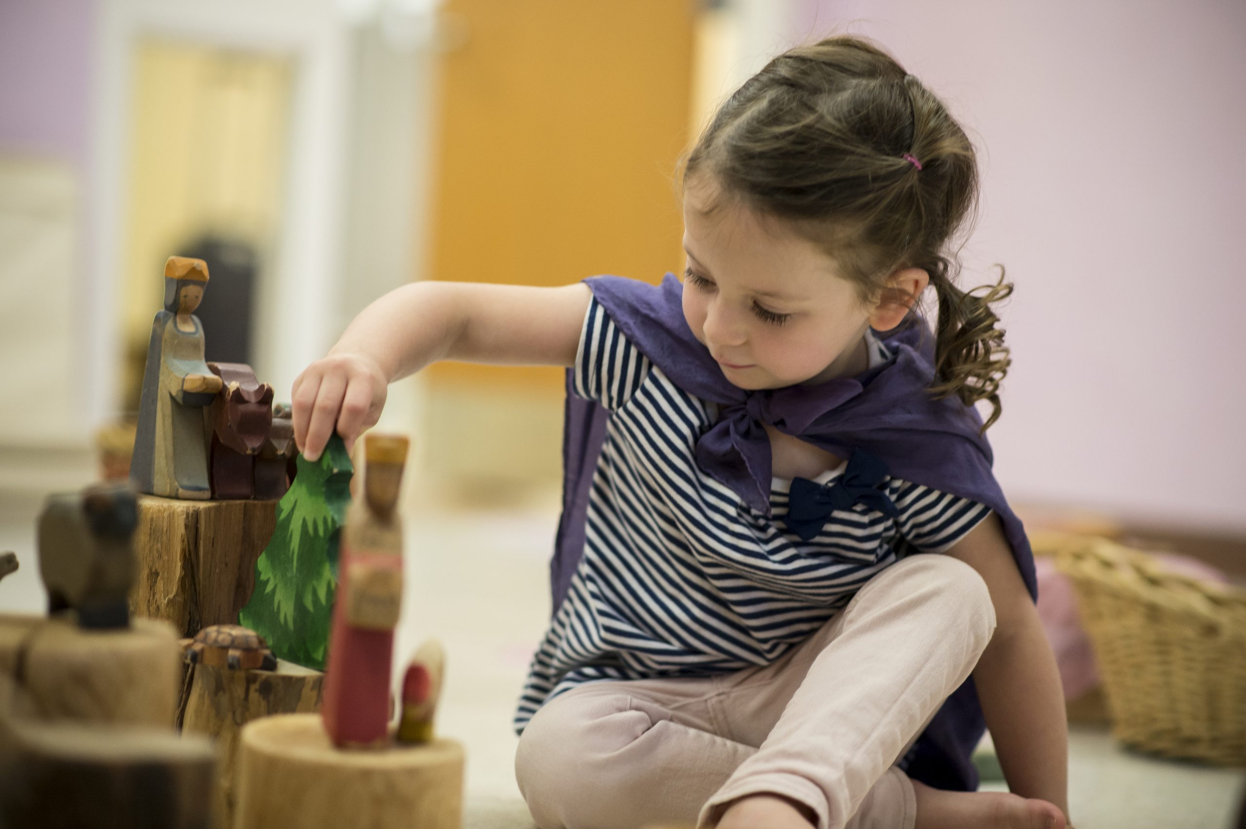 Tips for Reducing Screen Time for Kids A young girl plays.