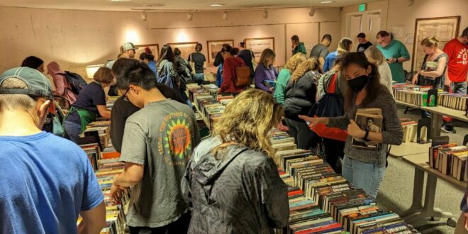 People browsing a book sale.