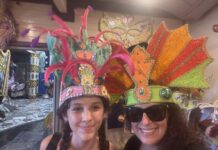 I Love It When We’re Cruisin’ Together: Take a Family Cruise A woman and her daughter wear colorful headdresses on a cruise