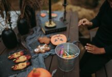 Halloween goodies and decorations on a table