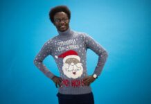 Person wearing a tacky Christmas sweater