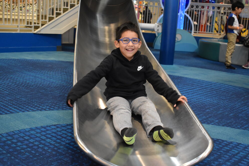 Child on a slide at Port Discovery Children's Museum
