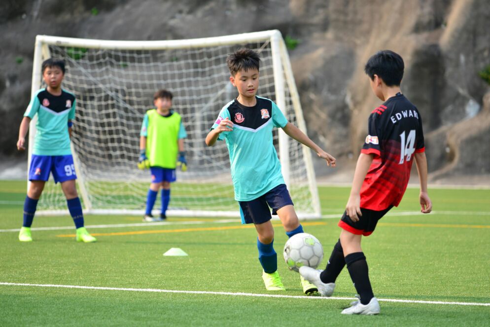 Children playing soccer