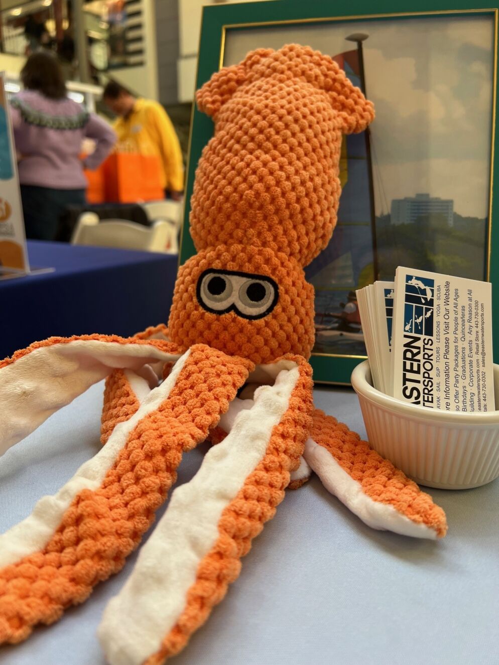 Eastern Watersports orange octopus plush at summer display for Baltimore's Child's Summer Camps & Activities Fair