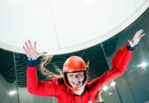 A child indoor skydiving at iFly