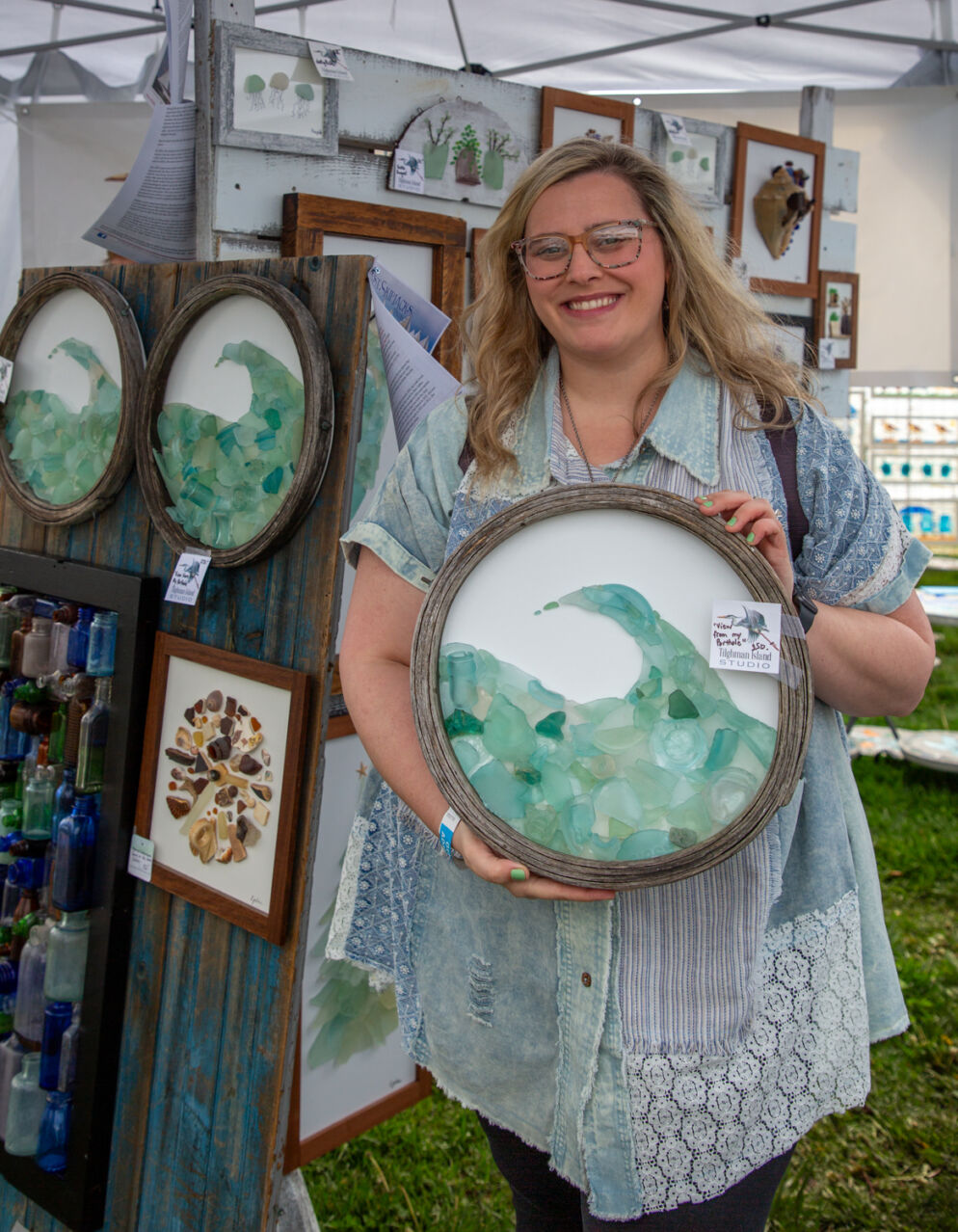 An artist displays her work at the Eastern Shore Sea Glass and Coastal Arts Festival 