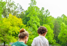 Camp as a Family A counselor with a camper at Camp Friendship, Palmyra, VA