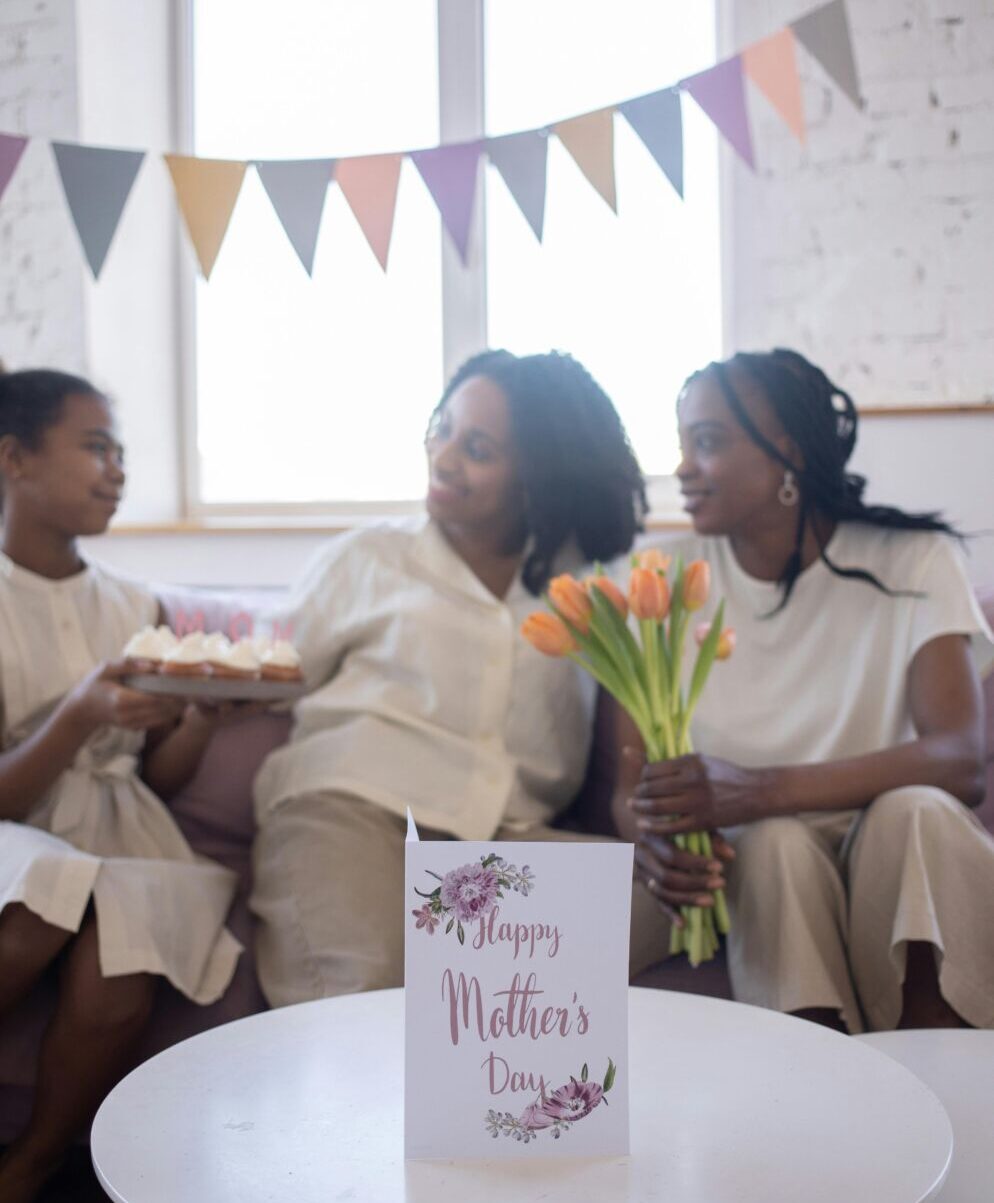 A mother and her two daughters celebrating Mother's Day