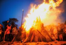 Things to Do in Baltimore This Weekend: June 12-14 Kids standing around a bonfire