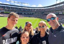 Dulany Reeves Dent (middle, back) at an Orioles game at Camden Yards with (left to right) son Gray, daughters Maddie and Charlotte and husband Matt. 