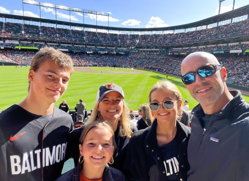 Dulany Reeves Dent (middle, back) at an Orioles game at Camden Yards with (left to right) son Gray, daughters Maddie and Charlotte and husband Matt.