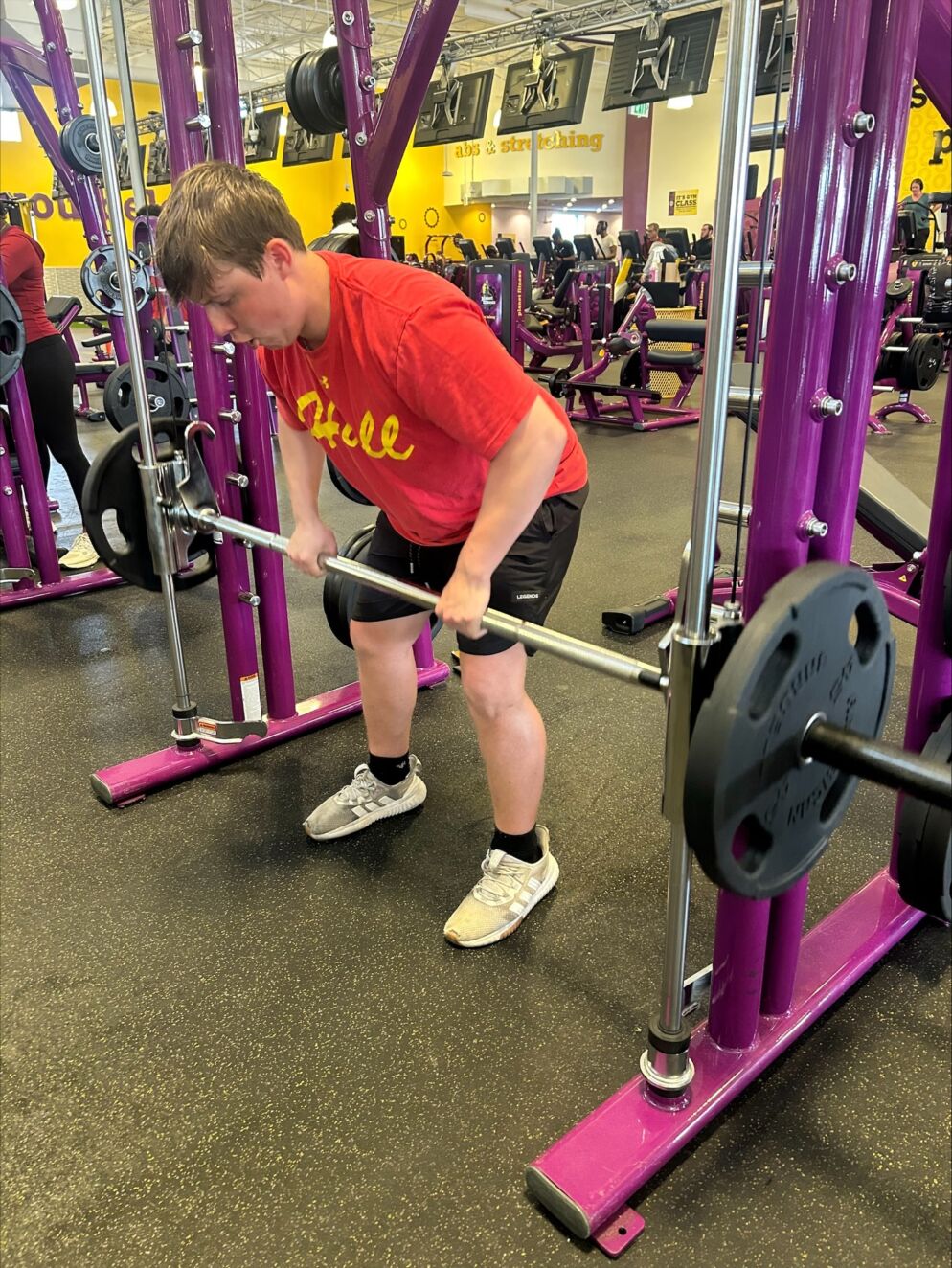 Caden George working out at Planet Fitness