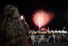 The Best Events in Baltimore This September A woman records fireworks on her phone