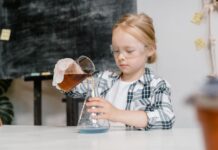 Young girl doing a chemistry experiment